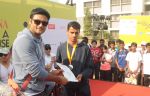 Manav Gohil felicitating the winner of _Femina Marathon-Run to Save The Girl Child_